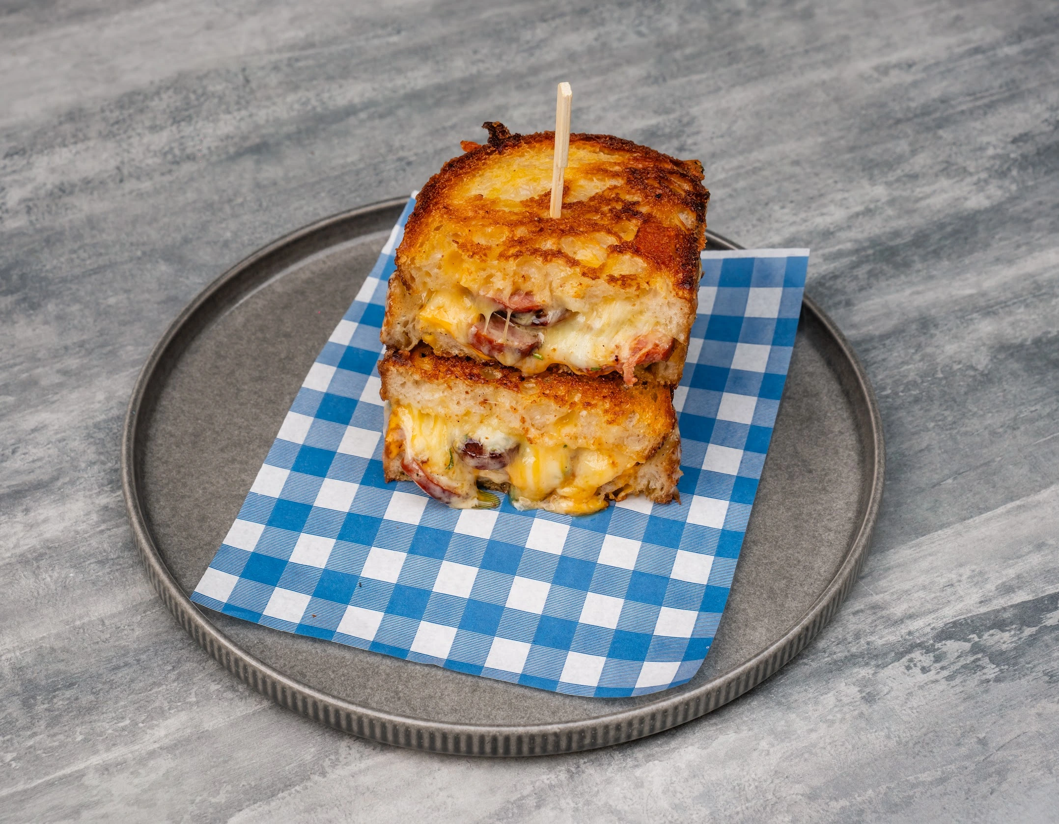 KFC-style Toastie with fried chicken tenders, mashed potato gravy and sourdough bread